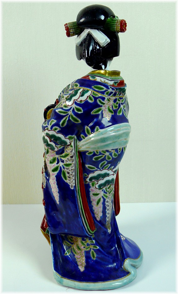japanese porcelain antique figure of a woman in blue kimono