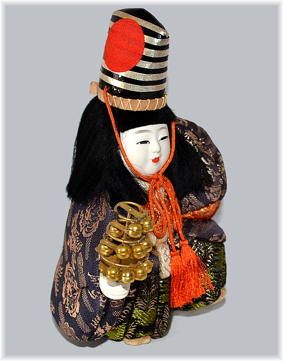 japanese kimekomi doll of a boy dancing with a rattlel, 1950-60's