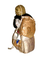 japanese antique kimekomi doll of a boy dancing with folding fan, 1930's