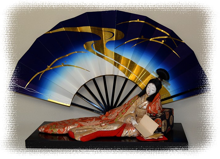 jpanese folding fan and antique doll