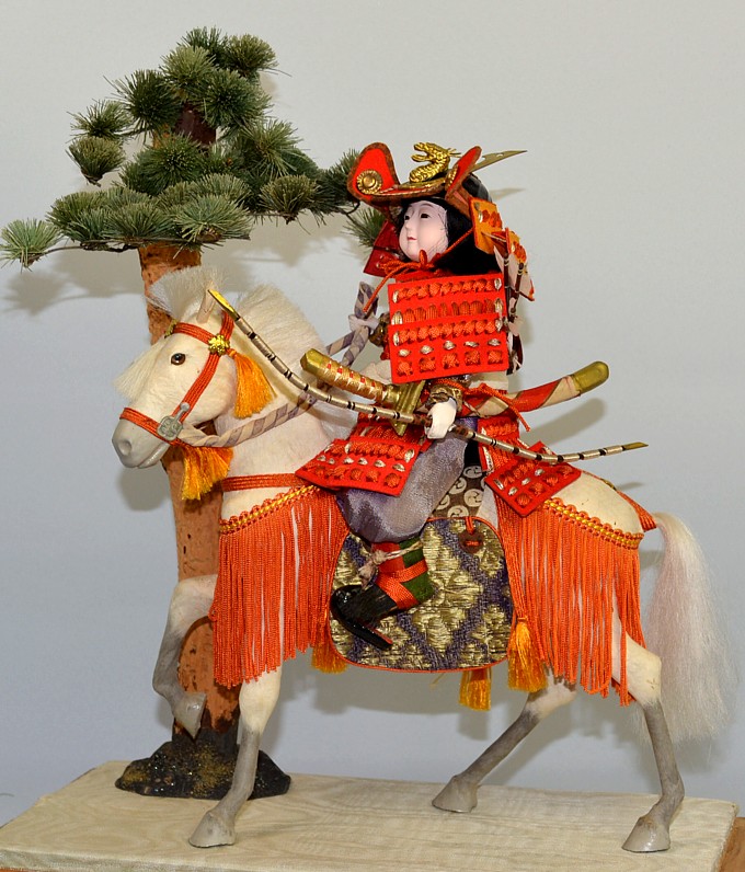 samurai on white battle horse, japanese doll