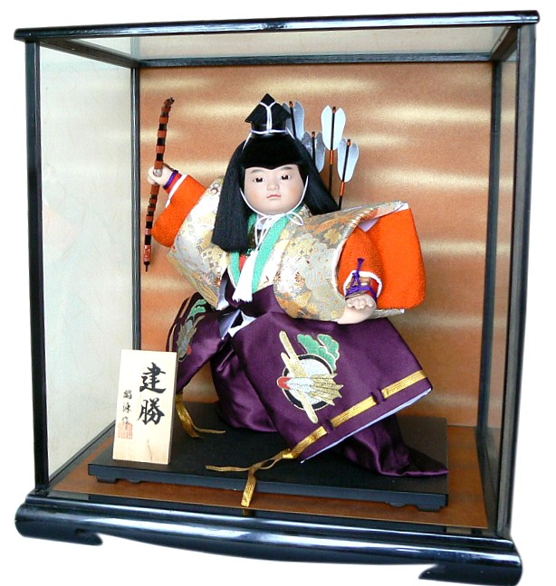 japanese doll in glass case