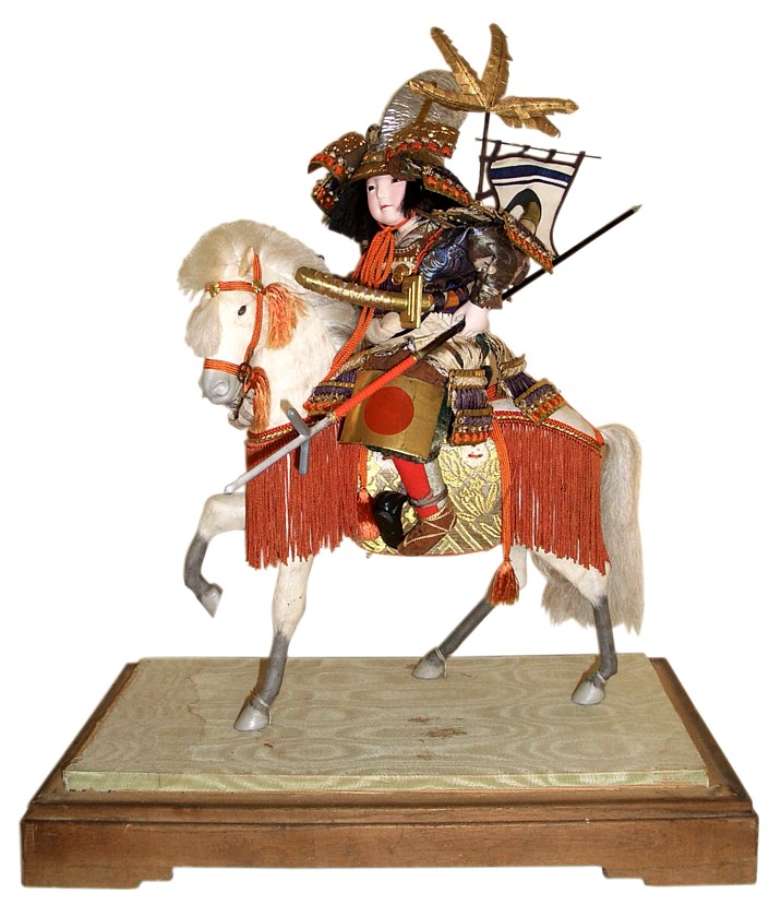 Japanese antique doll  of a samurai riding, 1920's