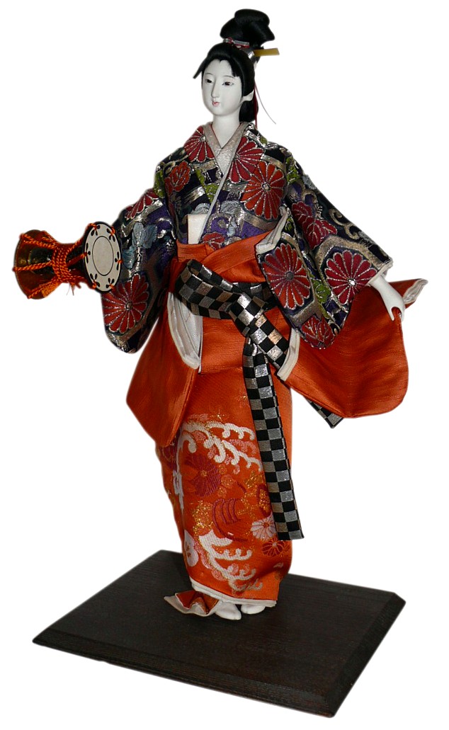 Japanese traditional doll og a geisha with small drum, 1950's