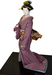 japanese traditional doll of a woman 
