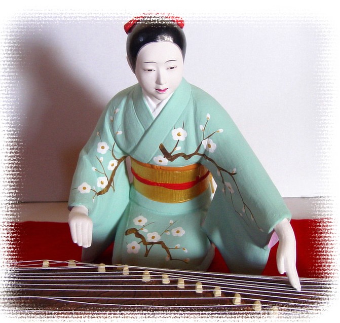 Japanese Hakata clay doll of young lady musician, 1950's