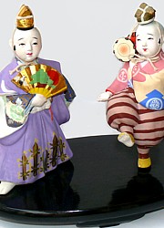 Japanese ceramic figurine of two dancing boys, 1930's