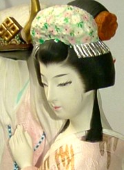 Japanese Hakata doll of a Princess with warrior lord' helmet in her hands, 1950's