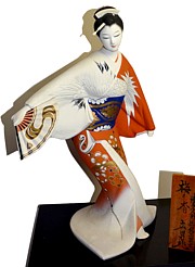Japanese hakata doll of a dancing  young woman with lfolding fan, 1980's
