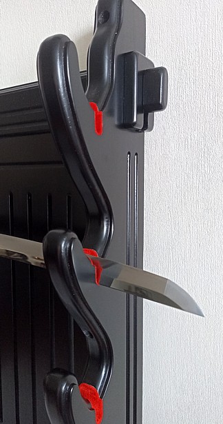 настенная подставка-крепление для коллекции самурайского оружия. Деталь