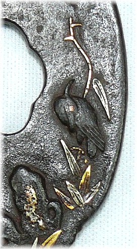 деталь изображения на кованной гарде японского меча