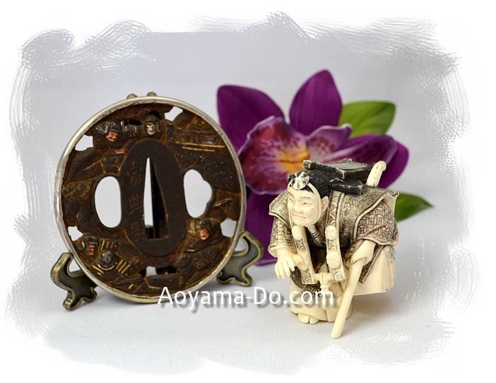 антикварная кованная цуба мастера Сотэн с изображениме самурайской битвы