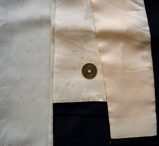 small yellowish stains on the kimono's lining