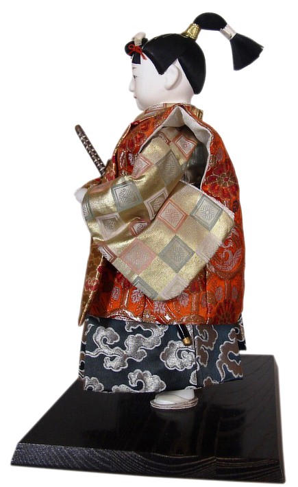 japanese traditional doll of a young samurai