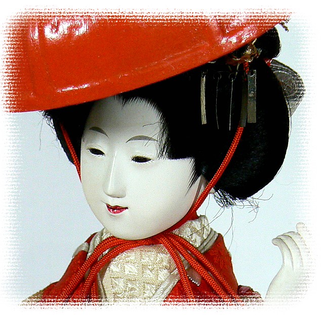 Japanese antique doll of a dancing Maiko with red hat, Taisho era