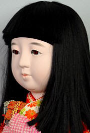 japanese traditional ichimatsu doll of a girl in wonderful kimono