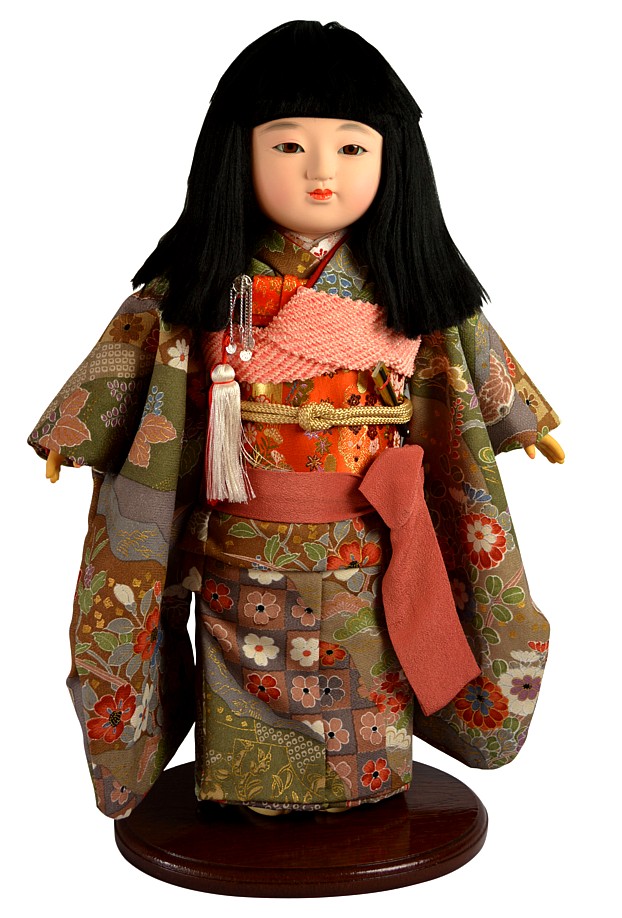 japanese traditional doll of a girl dressed with nice kimono