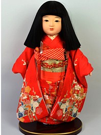 japanese doll of a girl dressed with festive attire. The Japonic Online Shop