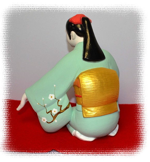 Japanese Hakata clay doll of a young lady musician, 1950's