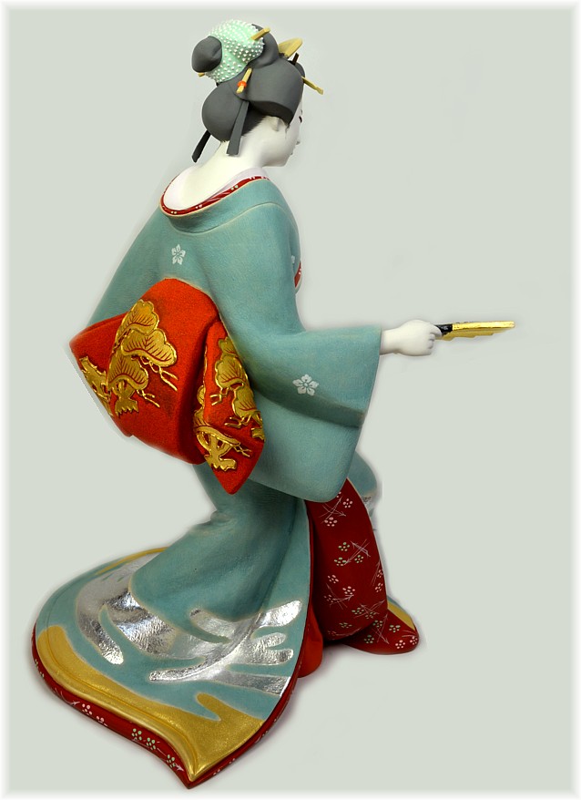 Geisha dancing with folding golden fan, Japanese Hakata 